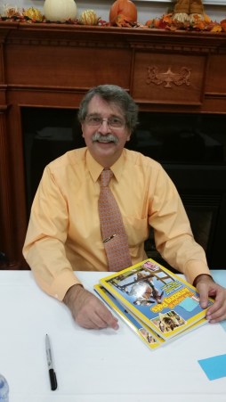 photo of John Micklos at a book signing